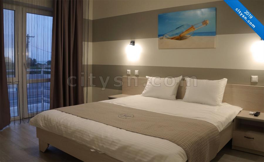 Номер «Двухкомнатный люкс с видом на море» гостиницы «Happy Inn» - фото №155102